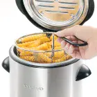 A close-up of the top of the 1-liter Electric Deep Fryer as a hand lifts the basket. French fries are in the basket.