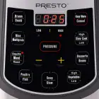 A close-up of the electric pressure cooker's digital control panel.