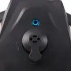 A close-up of the electric pressure cooker's quick pressure release valve and cover lock.