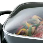 A close-up of the 16-inch Electric Skillet glass cover.