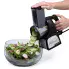 The Professional SaladShooter&reg; electric slicer/shredder slicing a cucumber into a salad.