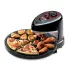 The Pizzazz Plus rotating pizza oven with pizza and convenience foods cooking on the baking pan.