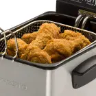 A close-up of the Stainless Steel ProFry immersion element deep fryer's basket.