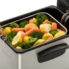 A close-up of the Stainless Steel ProFry immersion element deep fryer with steamed vegetables in the basket.