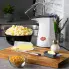 The Orville Redenbacher's hot air popper by Presto on a kitchen counter. Popped corn is in a bowl.
