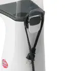 The power cord of the Orville Redenbacher's hot air popper by Presto wrapped in the storage position.