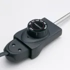 A close-up of the multi-cooker's removable heat control.