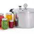 The 16-Quart Pressure Canner and four jars of canned food.