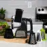The Professional SaladShooter&reg; electric slicer/shredder with processing cones and the funnel guide on a kitchen counter.