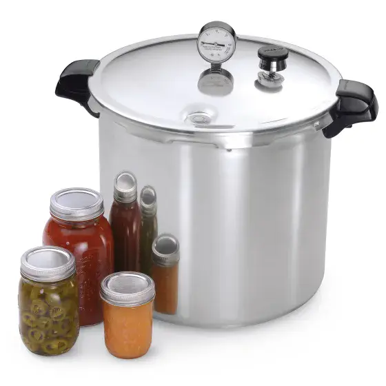01781 23-Quart Pressure Canner and three jars of canned food.