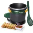 The Green and Gold FryDaddy electric deep fryer with the cover off, the scoop along side, and a plate of egg rolls in the foreground.