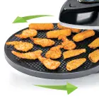 A close-up of the Pizzazz Plus rotating pizza oven showing how the baking tray rotates