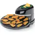 The Pizzazz Plus rotating pizza oven with a convenience foods cooking on the baking pan.