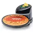 The Pizzazz Plus rotating pizza oven with a "football" pizza cooking on the baking pan.