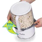 The PopLite Our Munch hot air corn popper being flipped.