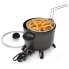 The Presto Kitchen Kettle multi-cooker/steamer with the glass cover off and onion rings in the basket.