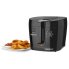 The CoolDaddy cool-touch deep fryer with the cover closed and a plate of onion rings to the left of the fryer.