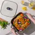 An overhead view of the 12-inch Electric Skillet being placed on a kitchen counter.
