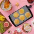 An overhead view of the Cool-touch Griddle cooking pancakes.