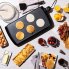 An overhead view of the 20-inch Cool-touch Electric Griddle with pancakes.