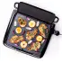 The Cool-touch Electric Griddle/Warmer Plus cooking pork chops.