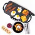 An overhead view of the 22-inch Electric Griddle cooking fried eggs, bacon, and French toast.
