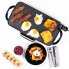 An overhead view of the 22-inch Electric Griddle cooking fried eggs, bacon, and French toast.
