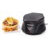 The Belgian Waffle Bowl Maker with the cover closed and a waffle bowl filled with chili on a plate.