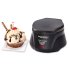 The Belgian Waffle Bowl Maker with the cover closed and a waffle bowl filled with ice cream on a plate.