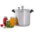 The 23-Quart Pressure Canner and jars of tomatoes, green beans, and apricots.
