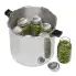 The 23-Quart Pressure Canner with the cover off and jars of green beans in and out of the canner.