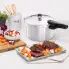 The 8-Quart Aluminum Pressure Cooker on a kitchen counter with a beef roast.