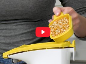 Link to a video showing how to measure popcorn into a Presto Hot Air Popper.