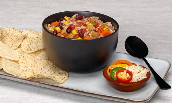 Black Bean Soup with Salsa Verde Pork in a bowl.