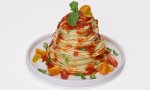 Spaghetti with tomato sauce on a plate.