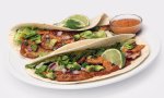 Two fish tacos on a plate.