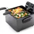 The Dual Basket ProFry immersion element deep fryer with the cover off. Steamed vegetables are in the baskets.