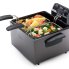 The Dual Basket ProFry immersion element deep fryer with the cover off. Steamed vegetables are in the baskets.