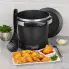 The GranPappy® electric deep fryer with the cover off. The scoop is leaning against the unit and a plate of deep fried fod is in the foreground.