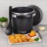 The GranPappy&reg; electric deep fryer with the cover off. The scoop is leaning against the unit and a plate of deep fried fod is in the foreground.