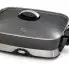 The 16-inch Electric Foldaway Skillet with the cover on.