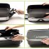 A four frame montage showing how the 16-inch Electric Foldaway Skillet's handles fold in for compact storage.