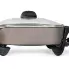 A profile view of the 12-inch Electric Skillet with the cover on.