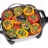 An overhead view of the 12-inch Electric Skillet with peppers cooking in the pan.