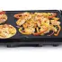 The Cool-touch Griddle cooking shrimp.