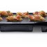 The Cool-touch Griddle cooking appetizers.