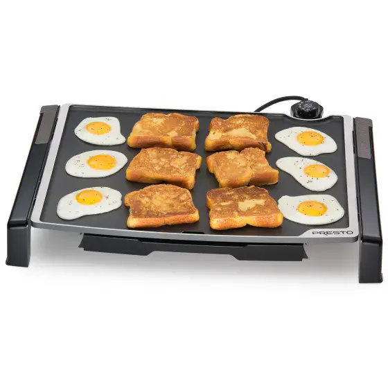 07073 Tilt-n-Fold XL Electric Griddle cooking eggs and French toast.