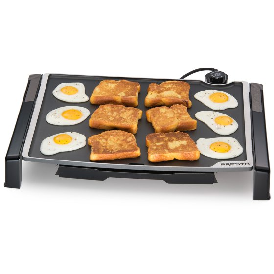 07073 Tilt-n-Fold XL Electric Griddle cooking eggs and French toast.