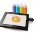 The PanGogh Pancake Art Griddle and four batter bottles.