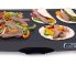 The Tilt'nDrain BigGriddle cool-touch griddle with tacos.